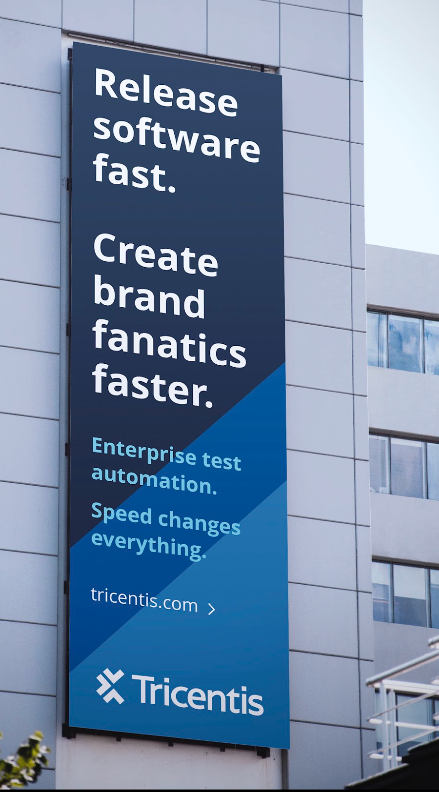 Tricentis ad on side of building
