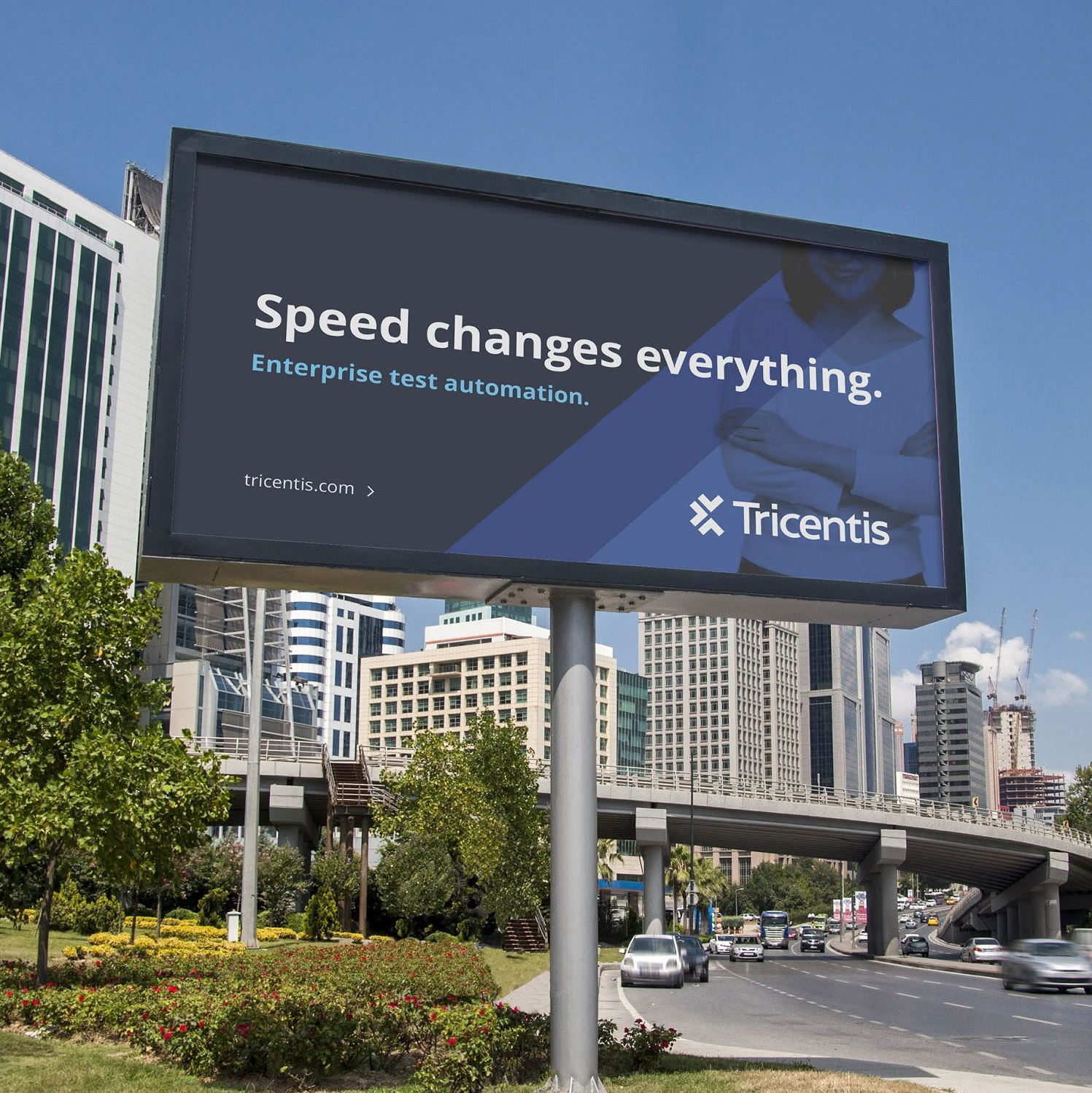A billboard advert reading "Speed changes everything. Enterprise test automation" 